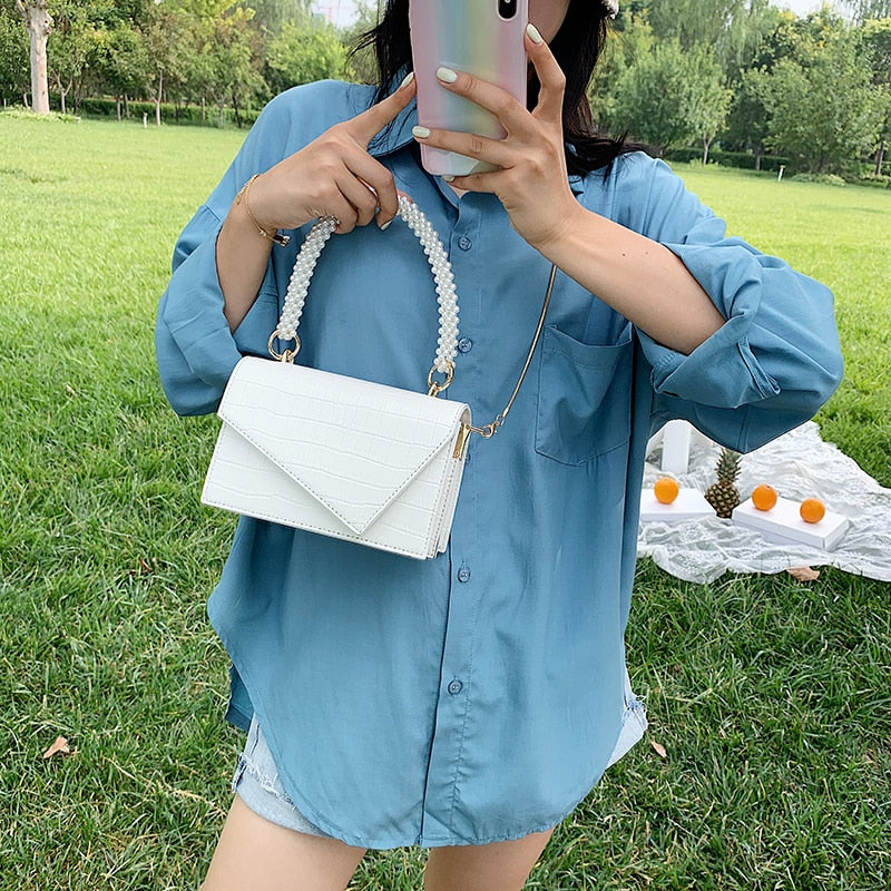 Grant תיק יד דמוי עור